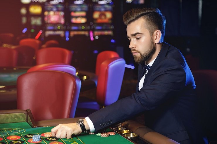 Dealer revealing hole card at showdown